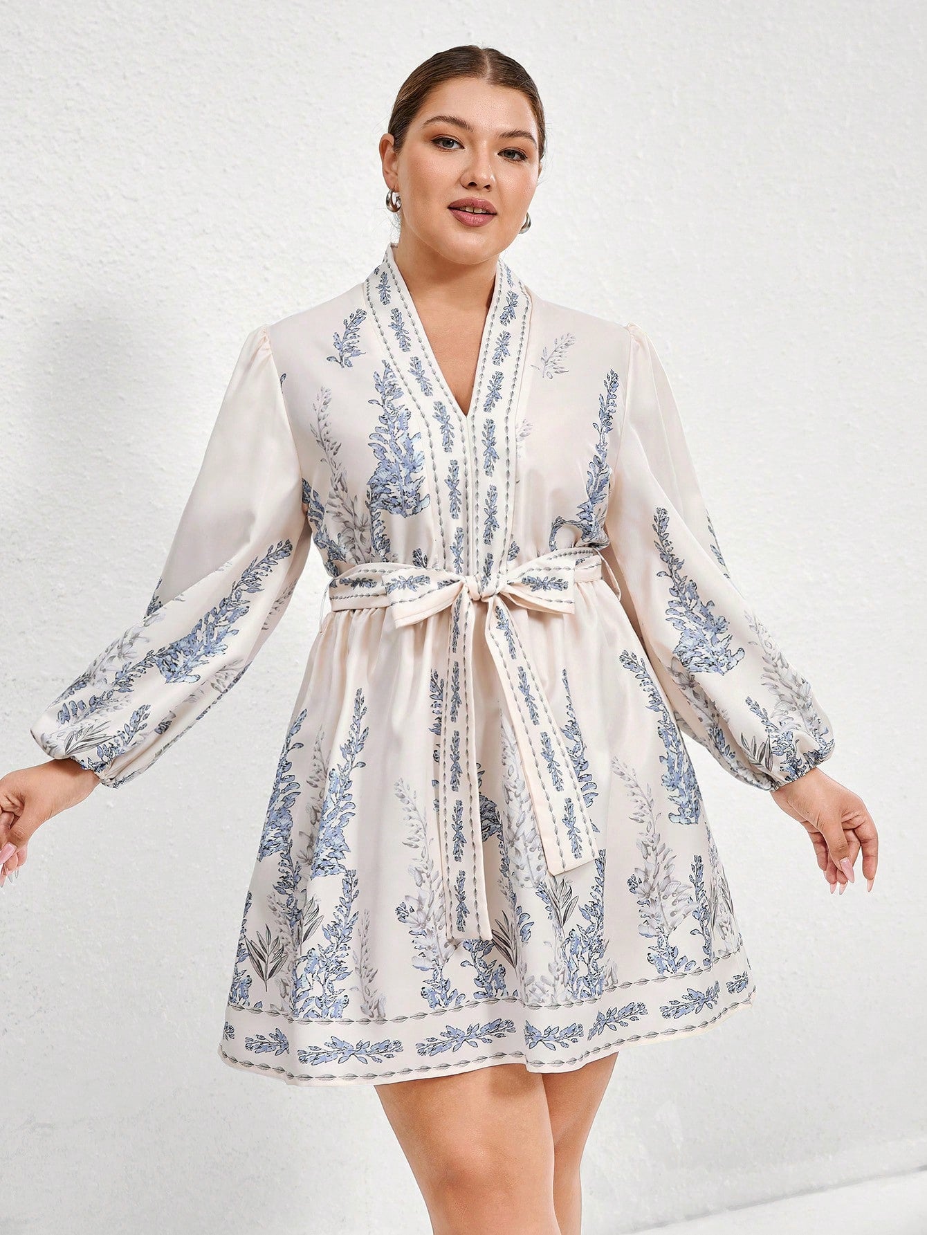 Step into vacation mode with this Elegant Plus Size Floral Wrap Dress! Featuring a flattering V-neck and a cinched waist, it effortlessly highlights your curves while keeping comfort front and center. The vibrant floral pattern adds a playful touch, perfect for sunny days and breezy evenings. Whether you're strolling the boardwalk or enjoying a seaside dinner, this dress brings easy elegance to your getaway wardrobe.