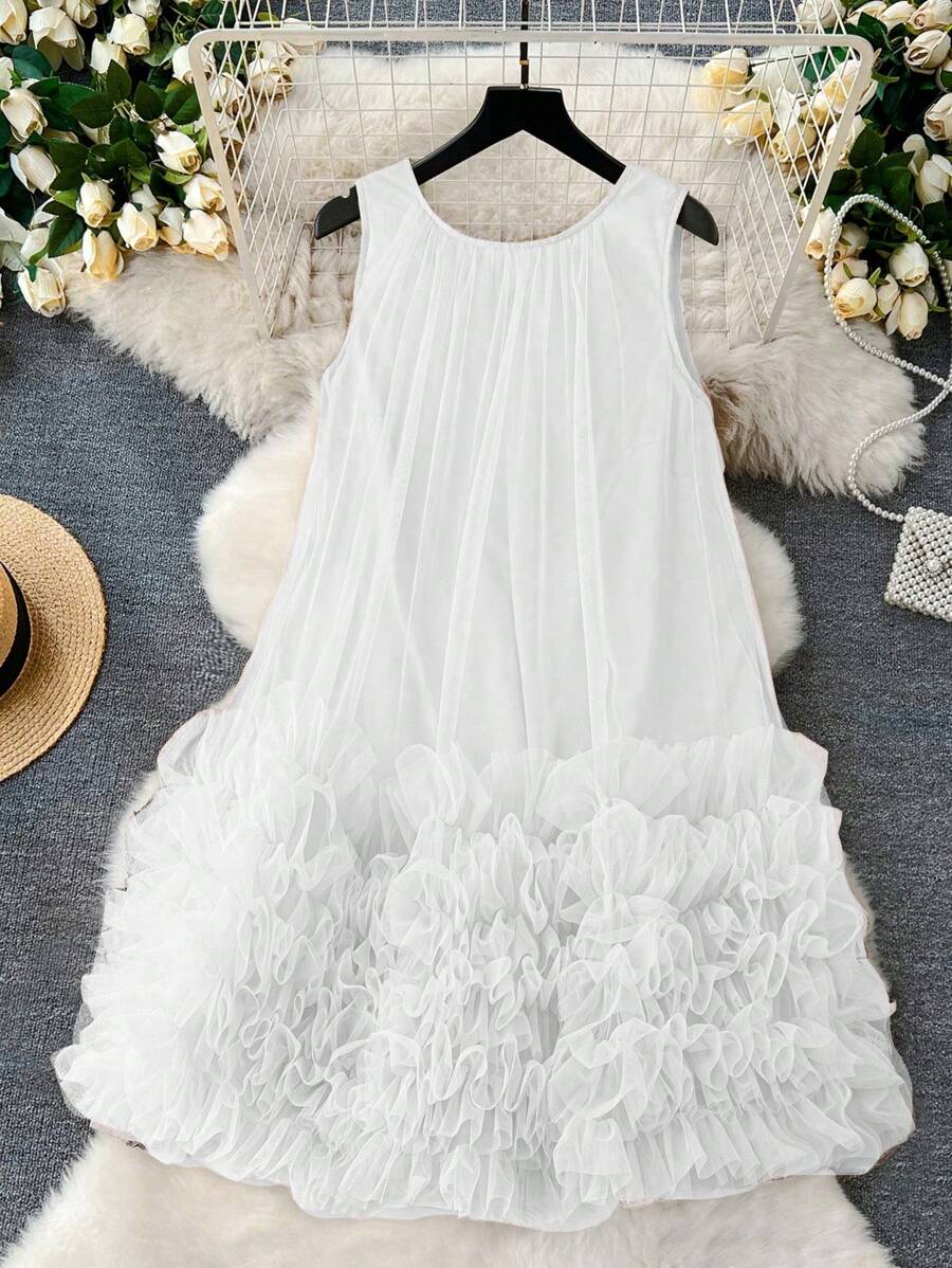 Step into sunshine and smiles with this Elegant Plus Size Flowy Sleeveless Ruffle Dress! Designed to move with you, its light fabric and playful ruffles bring effortless charm to your spring beach days or casual outings. Embrace comfort and style in every breeze while feeling fabulous and free. Perfect for twirling through warm afternoons with a splash of fun!