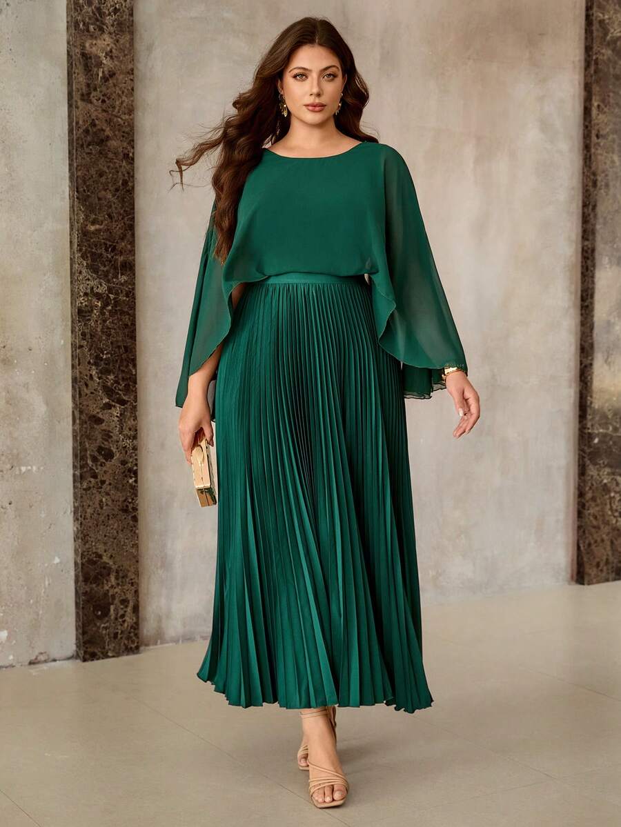 Experience the breathtaking fusion of Parisian heritage and sharp, modern architectural tailoring. This stunning pleated ensemble is meticulously designed for the woman who values a high-fashion, "quiet luxury" approach to versatile dressing—the ultimate centerpiece for prestigious formal events, exclusive casual retreats, and high-authority vintage-inspired outings.