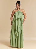Elevate your wardrobe with this stunning plus-size green halter neck dress, designed for those who embrace elegance and comfort. The flowing maxi silhouette features delicate ruffled details and a flattering tie-back design that creates a graceful, backless look perfect for beach getaways and special celebrations. Crafted from quality woven polyester with a lined interior, this dress offers a polished appearance while maintaining breathability. 