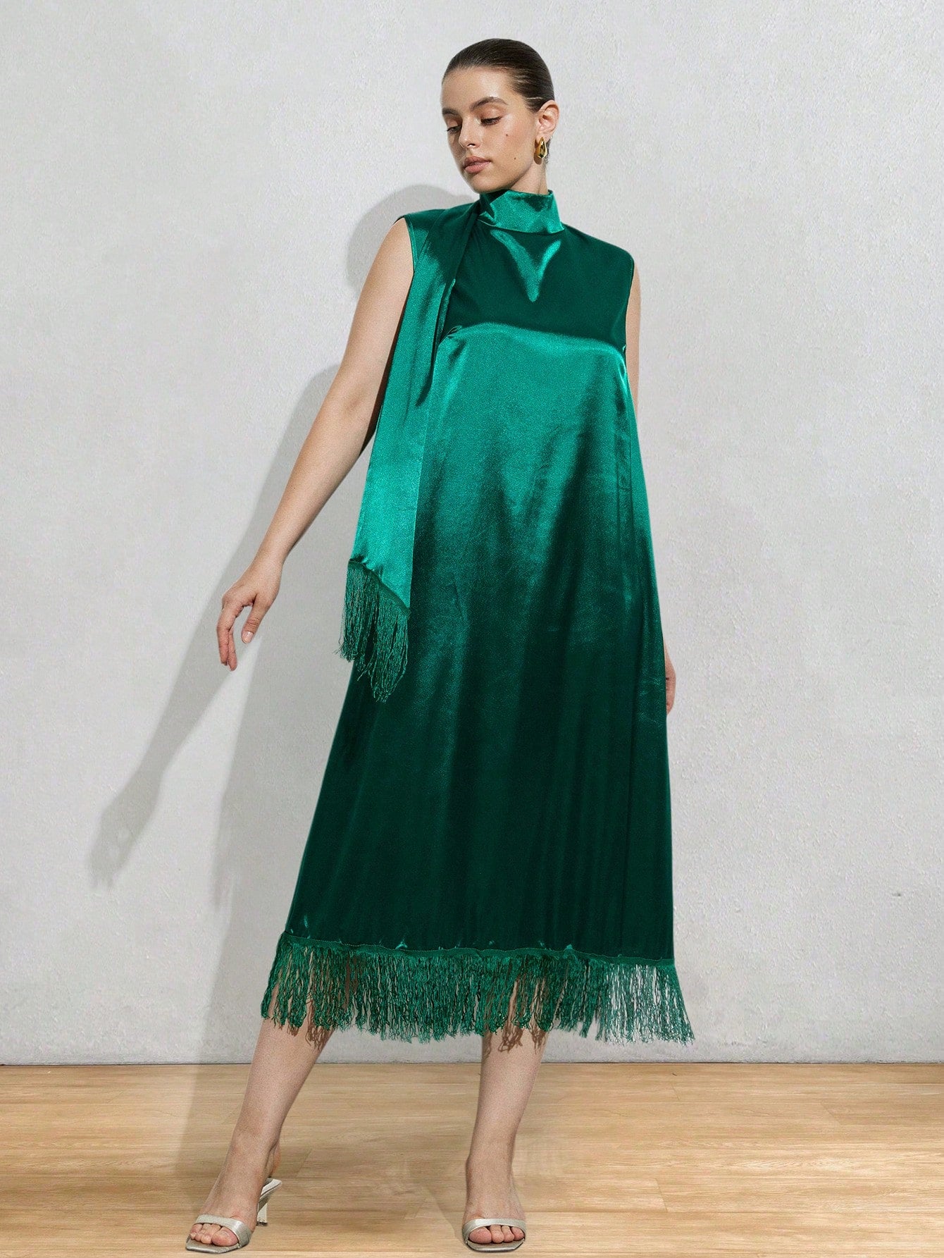 Step out in style and comfort with this Elegant Plus Size Halter Dress. Its solid color and loose, straight cut offer a flattering fit that moves with you, perfect for any occasion. The halter neckline adds a flirty touch, making it easy to dress up or down. Embrace effortless elegance with a playful twist!