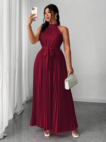 Turn heads on your next getaway with this Elegant Plus Size Halter Neck Vacation Dress. The romantic tie waist flatters your curves while the pleated skirt adds a flirty, flowing touch. Perfect for weddings or sunny celebrations, this dress blends comfort and style effortlessly—making every moment feel like a special occasion. Embrace your vacation vibes and step out with confidence and flair!