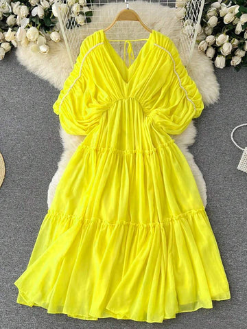 Turn heads with this playful hot pink tiered dress designed just for you. Its flowing layers add fun movement, while delicate pearl accents bring a touch of glamour. Perfect for celebrations or days you want to feel confidently vibrant, this plus size dress combines comfort and charm effortlessly. Step out and shine in style!