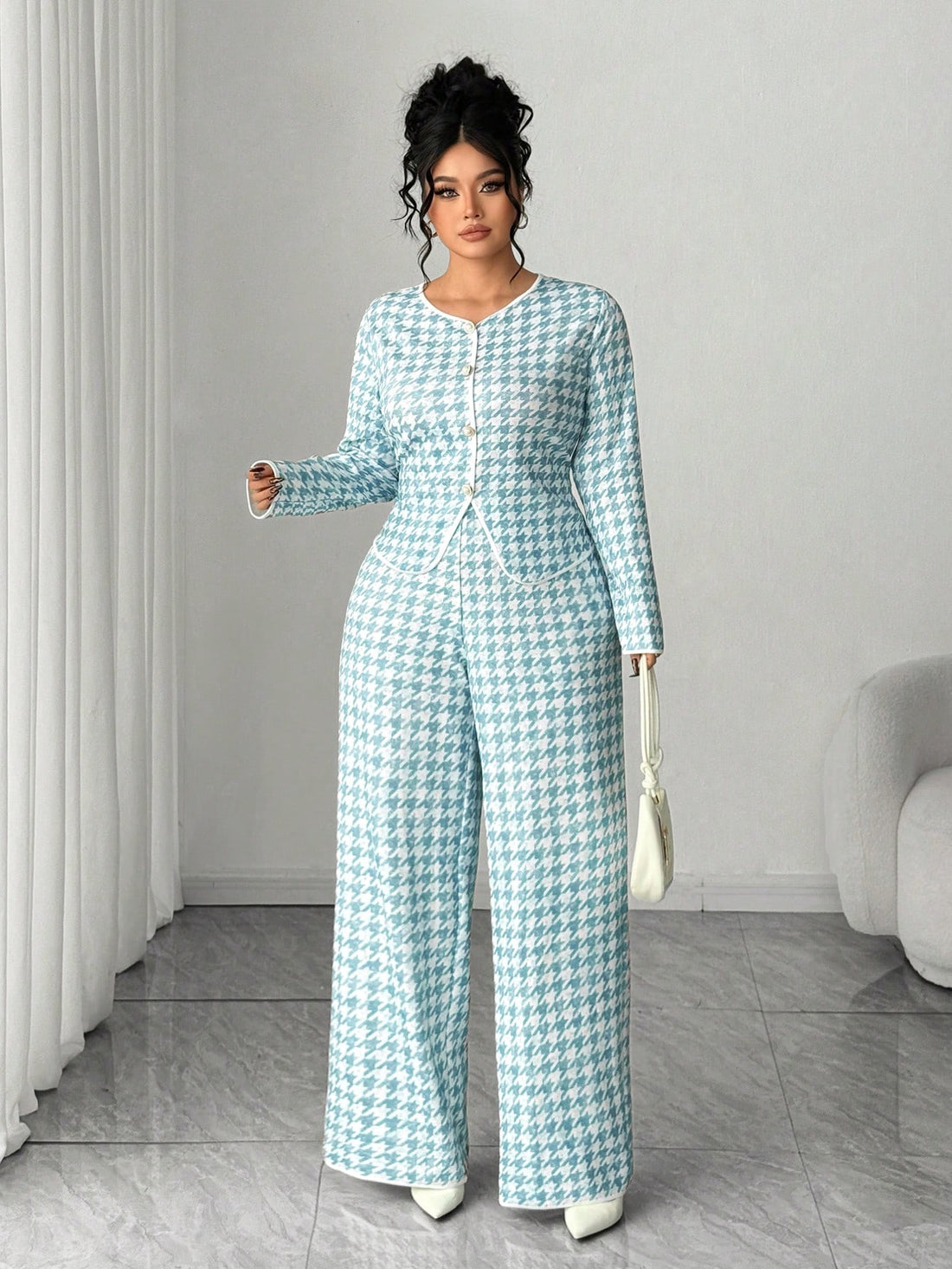 Elevate your winter wardrobe with this chic houndstooth two-piece set! Featuring a tailored cardigan paired with matching pants, this ensemble delivers timeless style with a modern twist. The classic houndstooth pattern works beautifully for layering or wearing as a complete look, making it perfect for everything from office meetings to weekend brunches. Designed with plus-size comfort in mind, the relaxed fit ensures you'll feel confident and fabulous all season long. Mix, match, or wear together—this vers