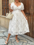 Elegant plus size jacquard dress with ruffle details and puff sleeves. A chic choice for weddings, parties, dinners, celebrations, and dressy events.