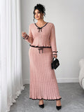 Elevate your autumn wardrobe with this chic two-piece set that's all about effortless sophistication! The soft knitted V-neck sweater pairs beautifully with a flattering fitted midi skirt, while the playful contrast color bow adds just the right touch of personality. Designed for the modern plus-size woman who refuses to compromise on style, this set transitions seamlessly from cozy weekends to polished outings. Perfect for layering through winter or standing solo when the weather warms up. Comfort meets el