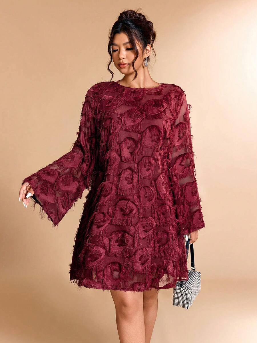 Back view of burgundy mini dress with keyhole and satin bow tie