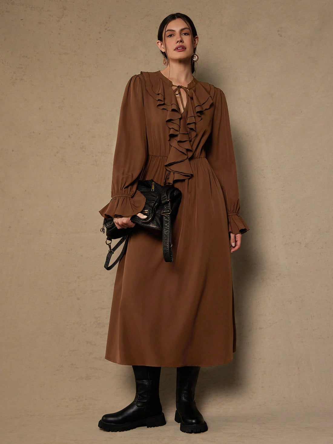 Elevate your wardrobe with this stunning plus-size dress that's equal parts sophisticated and fun! The long sleeves provide elegant coverage while the charming ruffle tie neck adds a flirty touch that draws the eye upward. Crafted in a timeless solid color, this versatile piece transitions seamlessly from office to evening events. The thoughtfully designed silhouette flatters curves beautifully, giving you confidence with every wear. Perfect for anyone who refuses to compromise on style or comfort—because l