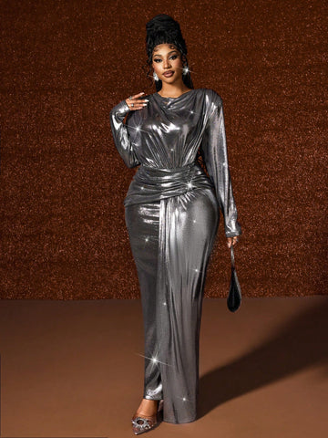 Make a statement in this show-stopping shiny dress that celebrates your curves with confidence and flair. The luxe long sleeves and luminous fabric create an otherworldly elegance, perfect for turning heads at any occasion. Whether you're stepping into the spotlight or commanding the room, this plus-size piece delivers high-fashion drama with a playful twist. Embrace your bold, futuristic style and let your presence shine as bright as the dress itself.