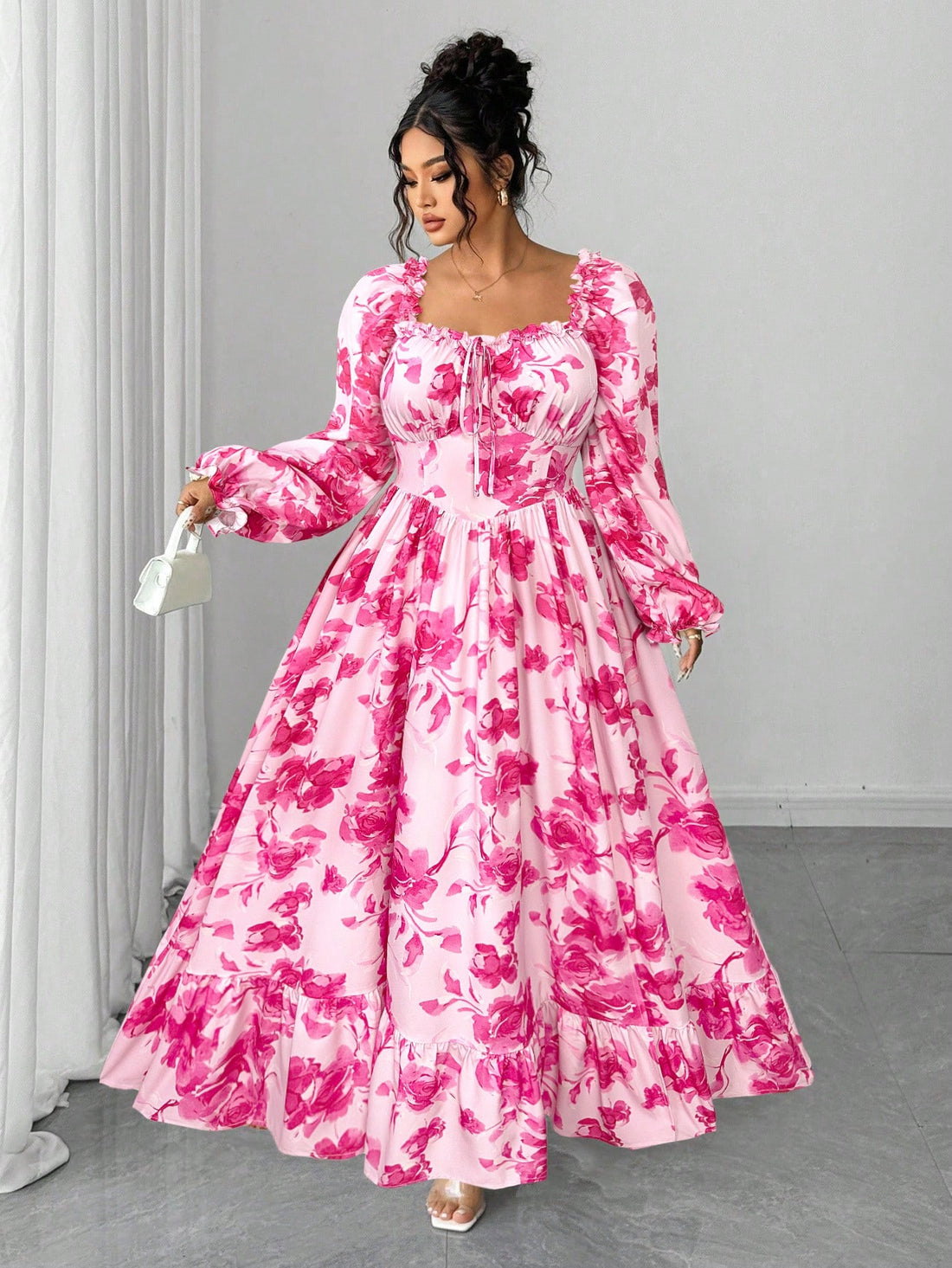 Twirl into any room with confidence in this stunning plus-size maxi dress! Featuring a charming floral ruffle hem that adds movement and personality, this versatile piece transitions seamlessly from casual coffee dates to evening celebrations. The flowing silhouette flatters your curves while the elegant design ensures you'll feel fabulous whether you're running errands or stealing the spotlight at special events. Comfort meets style in a dress that's as fun to wear as it is beautiful to look at.