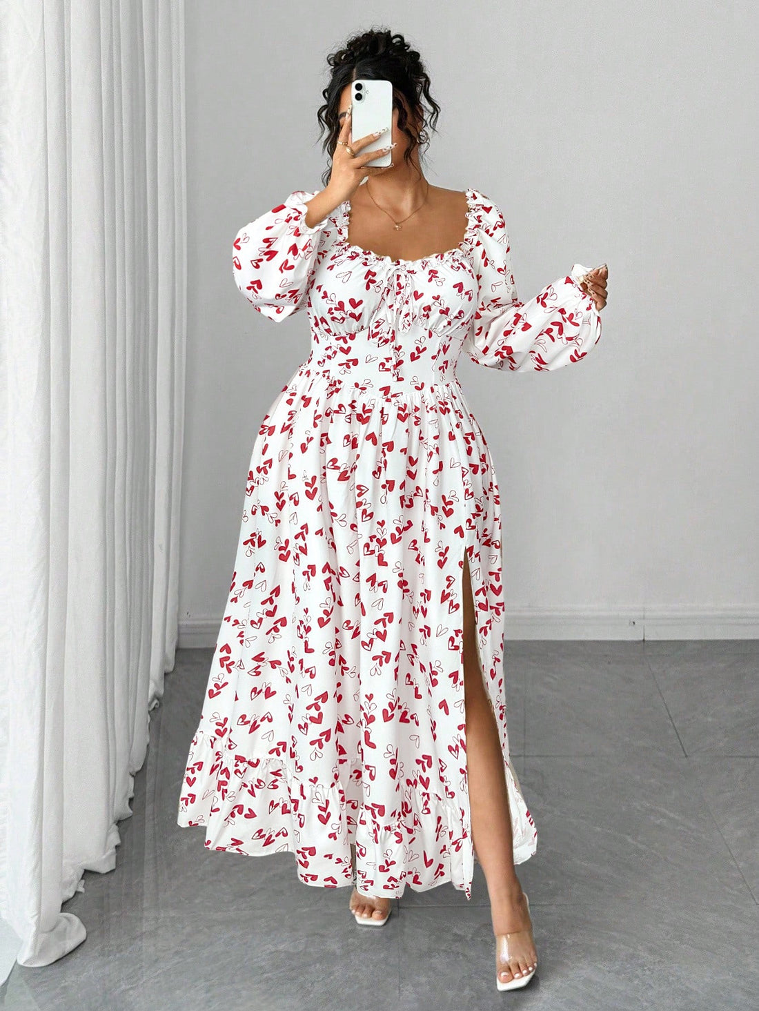 Celebrate yourself in this charming plus-size maxi dress that effortlessly transitions from casual coffee dates to evening celebrations. The delicate heart print adds a touch of whimsy and romance to your wardrobe, while the flowing silhouette flatters every curve with grace and comfort. Perfect for those moments when you want to feel fabulous without sacrificing ease, this versatile piece becomes an instant favorite for any occasion that calls for a little extra confidence and style.