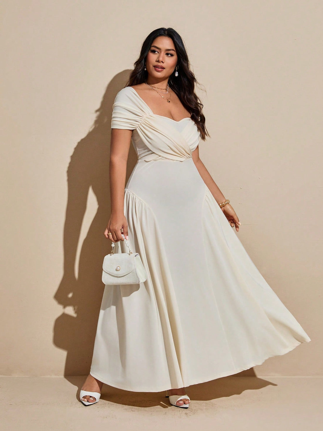 Step into the spotlight with this Elegant Plus Size Maxi Party Dress, designed to turn heads! Featuring playful crossed cutouts and a flattering sweetheart neckline, it combines charm and confidence effortlessly. The flowing maxi length adds a touch of drama, perfect for dancing the night away or making a grand entrance at any celebration. Celebrate your curves in style and let your personality shine with this stunning party dress.