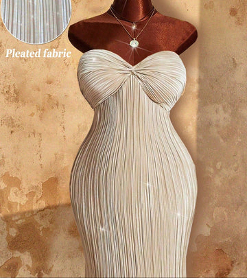 Shine bright at any celebration with this Elegant Plus Size Metallic Sheen Pleated Maxi Dress. Its shimmering fabric and flowing pleats create a striking silhouette that moves with you, perfect for turning heads at holiday parties or formal events. Designed to flatter curvier shapes, it combines comfort with glamour so you can dance the night away feeling fabulous and confident.