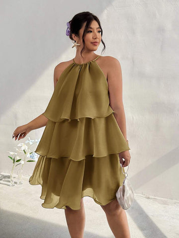 Front view of olive tiered halter dress with ruffled A-line skirt