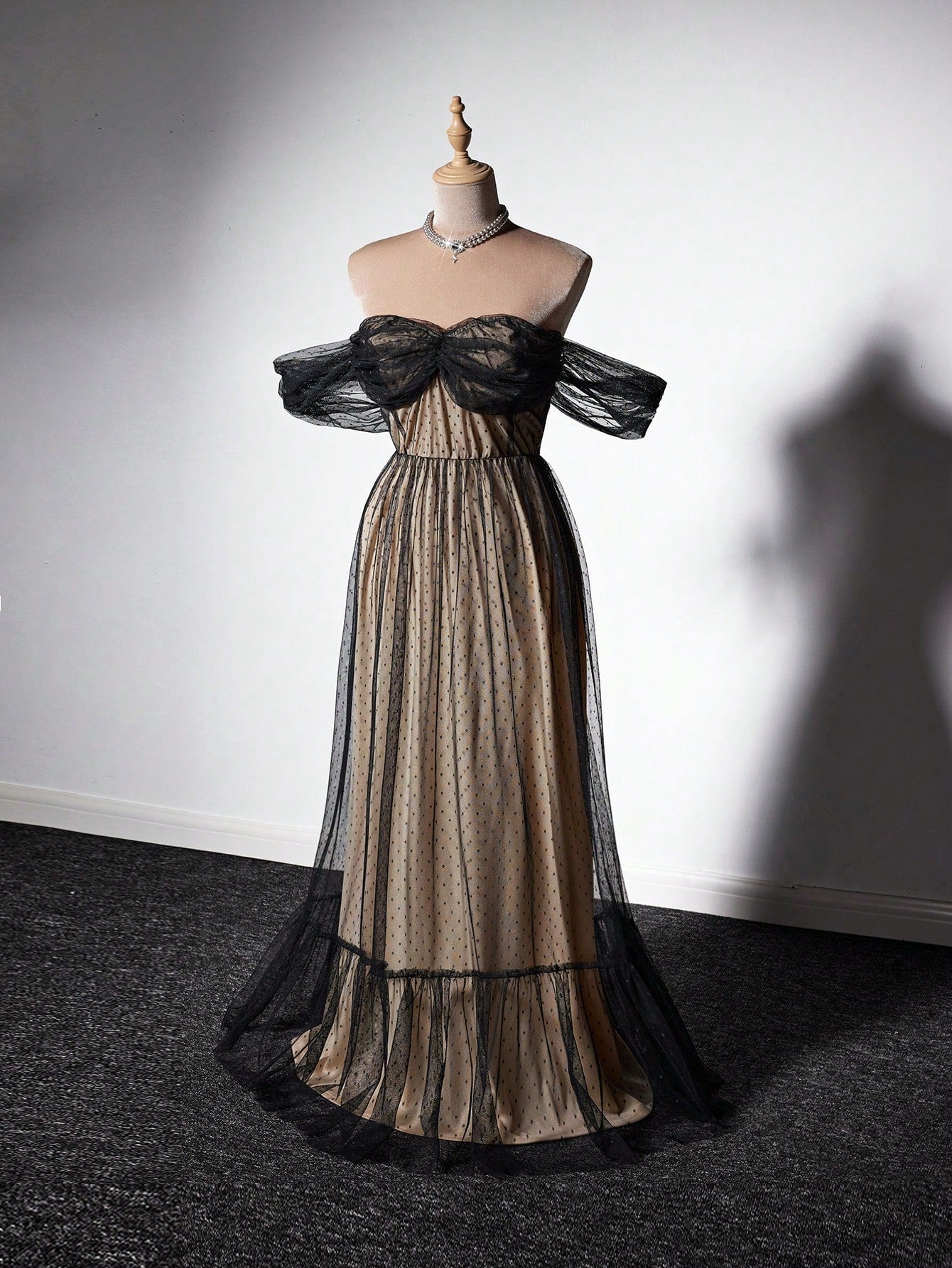 Step out in style with this Elegant Plus Size Off-Shoulder Polka Dot Mesh Dress. Its playful polka dot pattern and sheer mesh fabric create a flirty, fun look, while the off-shoulder design adds a touch of charm. Perfect for any occasion where you want to feel confident and fabulous.