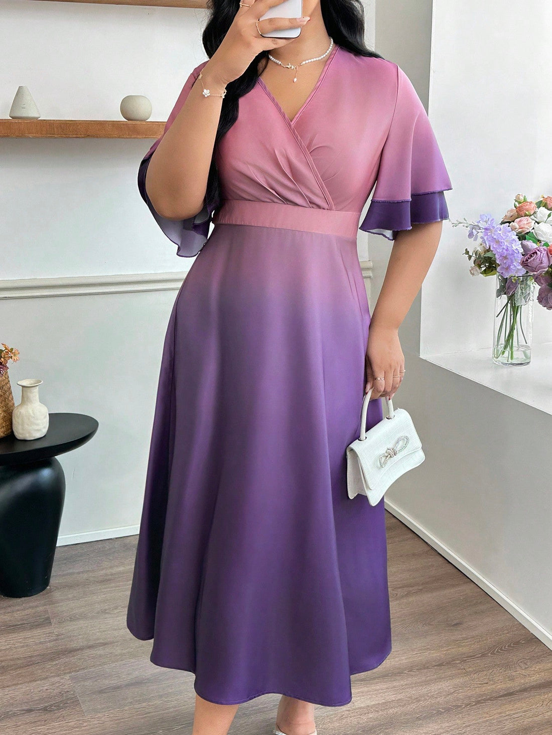 Step into style with this Elegant Plus Size Ombre V-Neck Flare Dress! Featuring playful ruffle sleeves and a flattering cinched waist, this dress adds a fun twist to your wardrobe. The beautiful ombre gradient gives a fresh, eye-catching vibe, while the flare silhouette lets you twirl with confidence. Perfect for any occasion where you want to shine and feel fabulous!