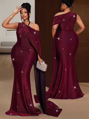 Make a statement at your next celebration in this stunning one-shoulder dress that's as fabulous as you are! The luxe shiny fabric catches the light beautifully, while the expertly designed silhouette flatters your curves and creates a sleek, streamlined look. Perfect for weddings, parties, and any occasion where you want to feel absolutely radiant. This plus-size beauty combines elegance with comfort, so you can dance, mingle, and shine all night long without a second thought. Confidence has never looked s