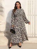 Step out in style with this Elegant Plus Size Leopard Print Dress, featuring a chic pleated front and a flattering sash to cinch your waist. The long sleeves add a touch of French-inspired sophistication, while the playful leopard pattern keeps things fun and fashionable. Perfect for any occasion where you want to feel confident and effortlessly stylish.
