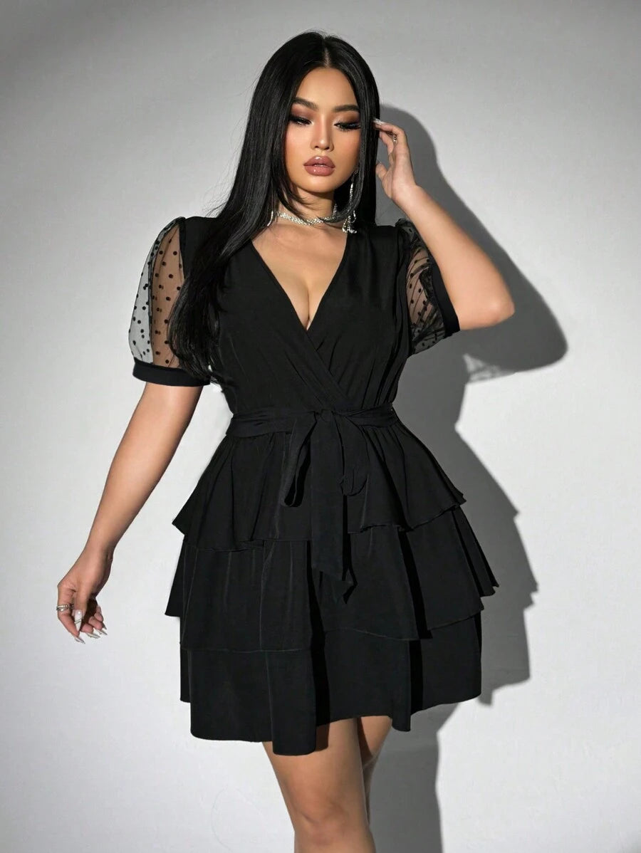 Step out in style with this Elegant Plus Size Polka Dot Patchwork Dress! Featuring charming puff sleeves and a flattering tie waist, it combines playful patterns with a comfortable fit. Perfect for adding a fun, feminine touch to your wardrobe while celebrating your curves with confidence.