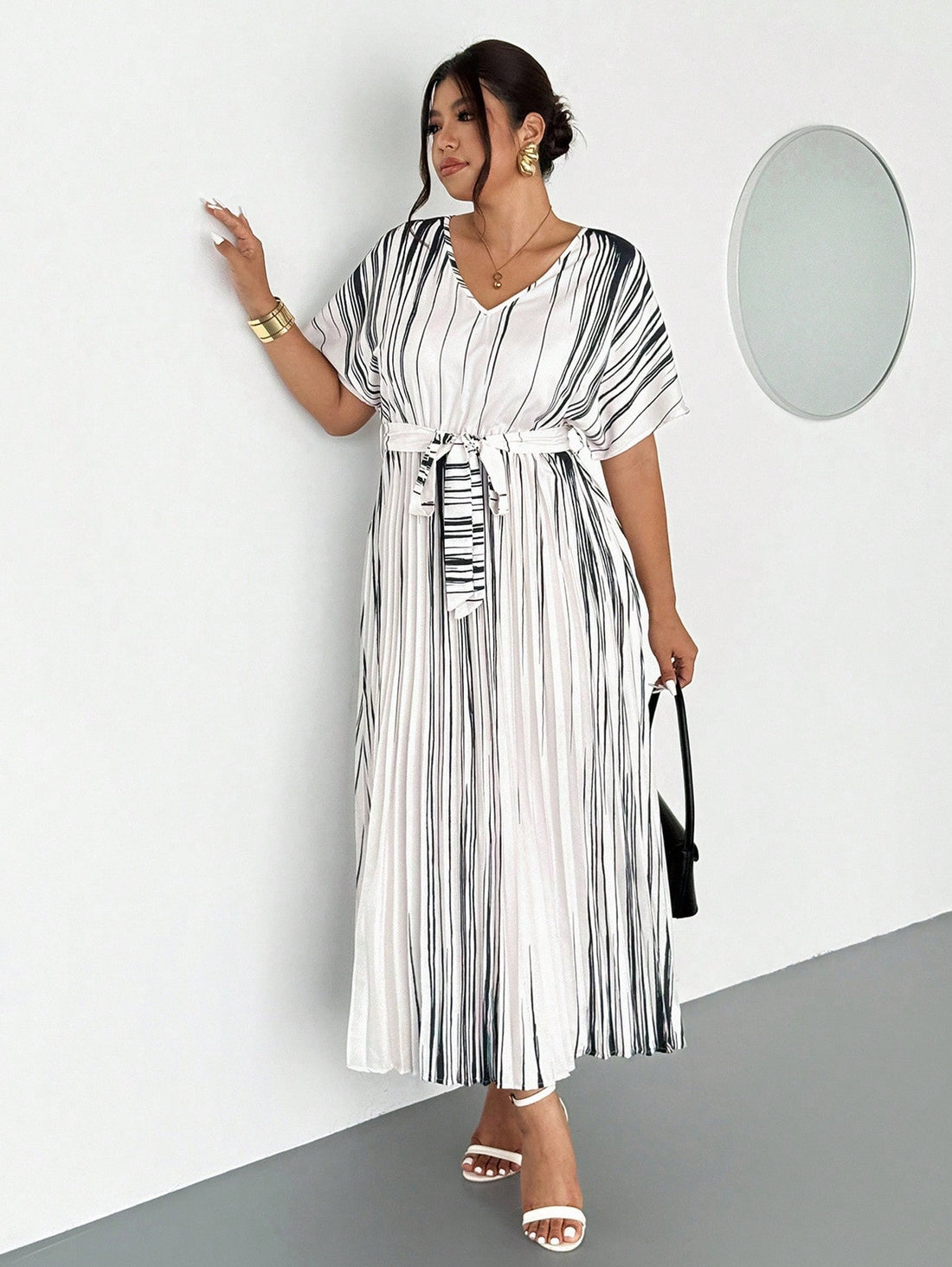 Step into spring and summer with this elegant plus size ruffle casual dress, designed to bring charm and comfort to your wardrobe. Its playful ruffles add a flirty twist, making it ideal for both workdays and vacation getaways. Lightweight and breezy, this dress moves with you, keeping you cool and confident no matter where the day takes you. Embrace effortless style that flatters your curves and lifts your mood!