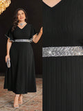 Turn heads with this playful yet elegant plus-size dress, featuring dazzling sequin patchwork that catches every light. The flounce trim adds a flirty touch, while short sleeves keep it breezy and comfortable. Perfect for dancing the night away or making a sparkling entrance at any event. Celebrate your curves with style and a hint of shimmer!