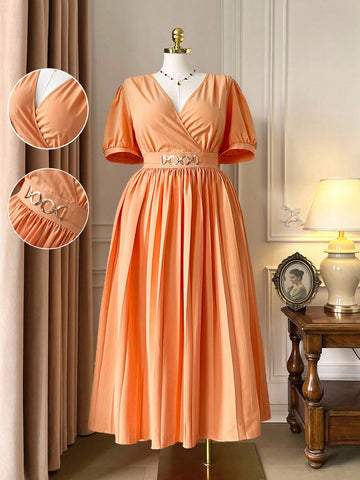 Step out in style with this Elegant Plus Size Short Sleeve Dress, designed to flatter every curve. The playful pleated waist adds a touch of charm, while the sleek metal accent brings a dash of sparkle to your look. Perfect for any occasion, this dress combines comfort and sophistication effortlessly.