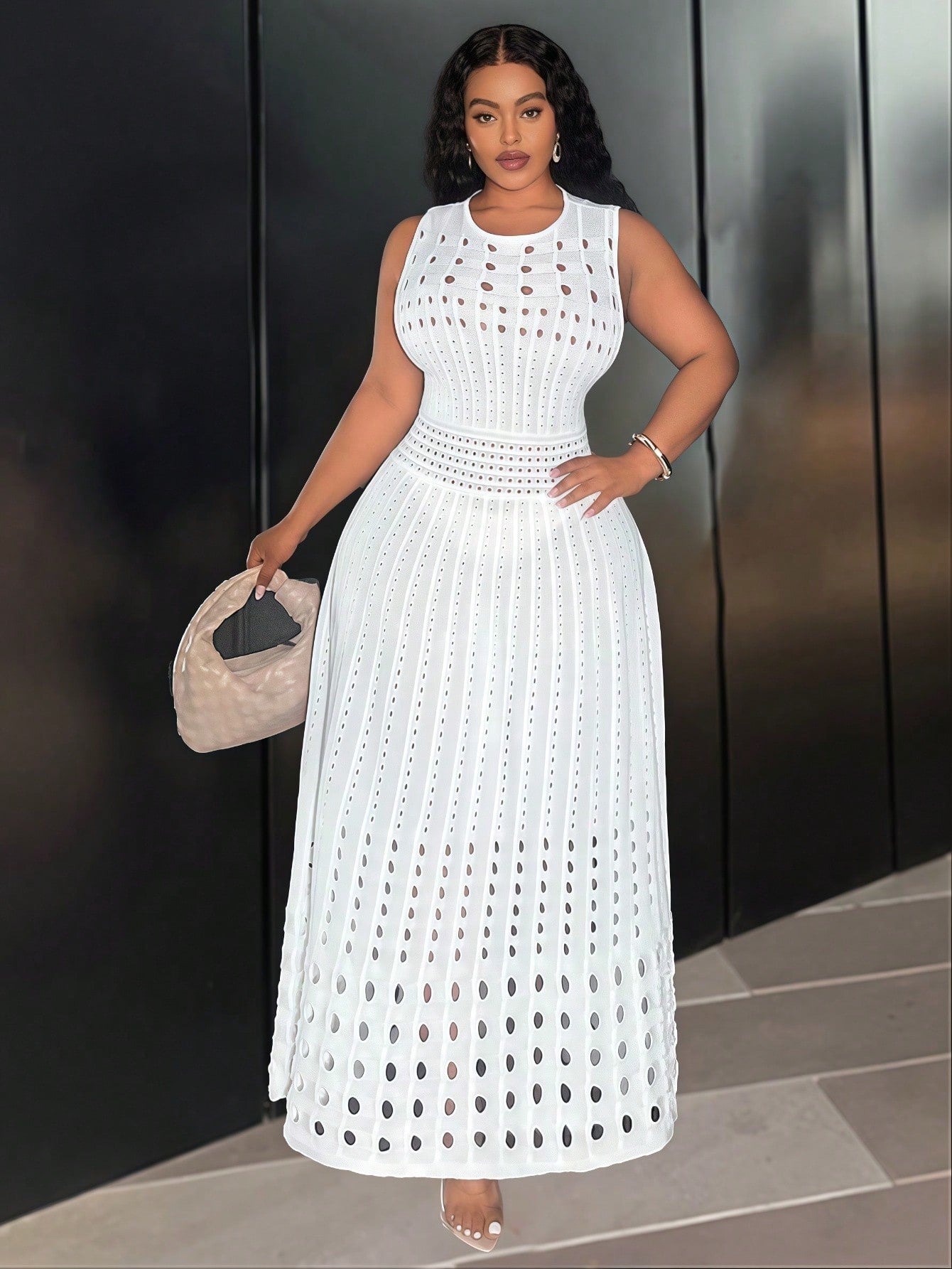 Step into autumn and winter parties with flair in this Elegant Plus Size Sleeveless Knit Dress. The playful hollow design adds a chic twist while keeping you cozy without sleeves. Perfectly cozy yet stylish, it flatters your curves and lets you dance the night away in confidence and comfort. Celebrate every moment wrapped in warmth and charm!