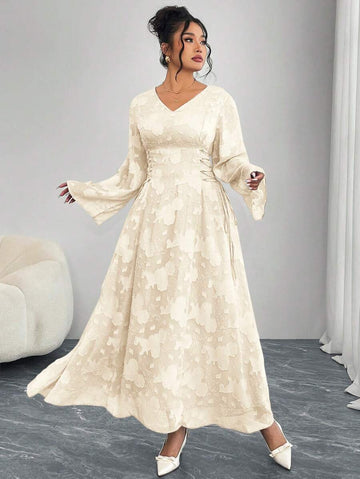 Step into charm and comfort with this Elegant Plus Size Solid Color Dress. Featuring playful cut-outs and flared sleeves, it brings a fun twist to sophistication. The cross tie waist highlights your silhouette while adding a flirty touch. Perfect for making every occasion effortlessly stylish!