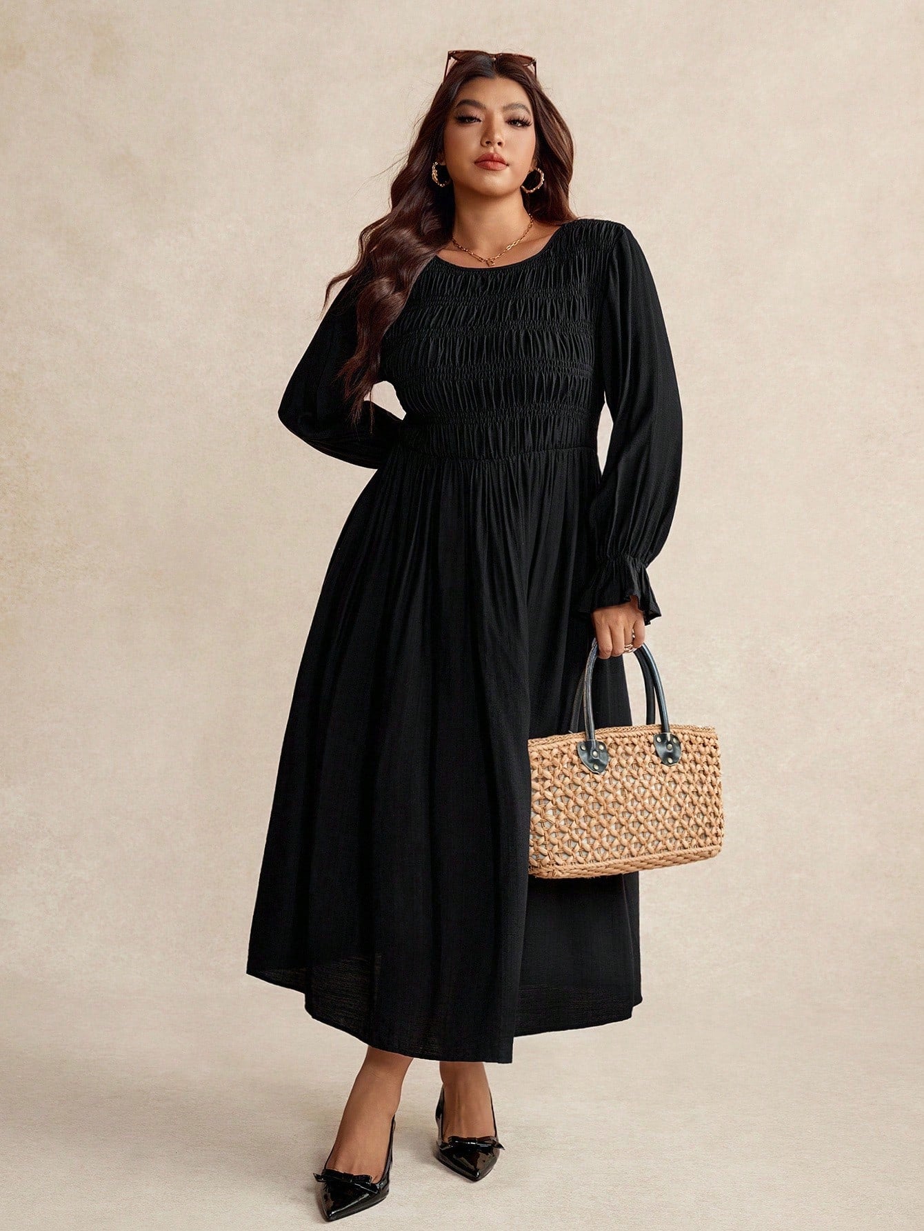 Slip into effortless sophistication with this stunning plus-size dress that celebrates your curves in all the right ways. The rich solid color and flowing long sleeves create a timeless silhouette, while the pleated detail adds a playful twist that keeps things interesting. Perfect for everything from brunch dates to evening events, this dress proves that elegance has no size limit. Comfort meets style in a piece designed to make you feel absolutely fabulous.
