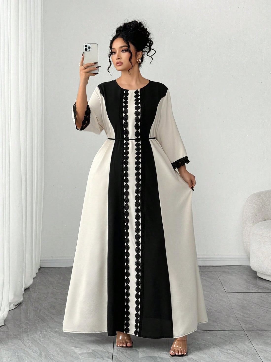 Embrace the season in style with this stunning plus-size summer dress that celebrates your curves with confidence. Featuring a chic colorblock design that flatters and elongates, this piece combines a cinched waist for definition with playful ruffle trim that adds movement and personality. Perfect for everything from casual brunches to evening outings, the breathable fabric keeps you cool while the thoughtful tailoring ensures you look and feel amazing. A wardrobe essential that proves summer fashion should