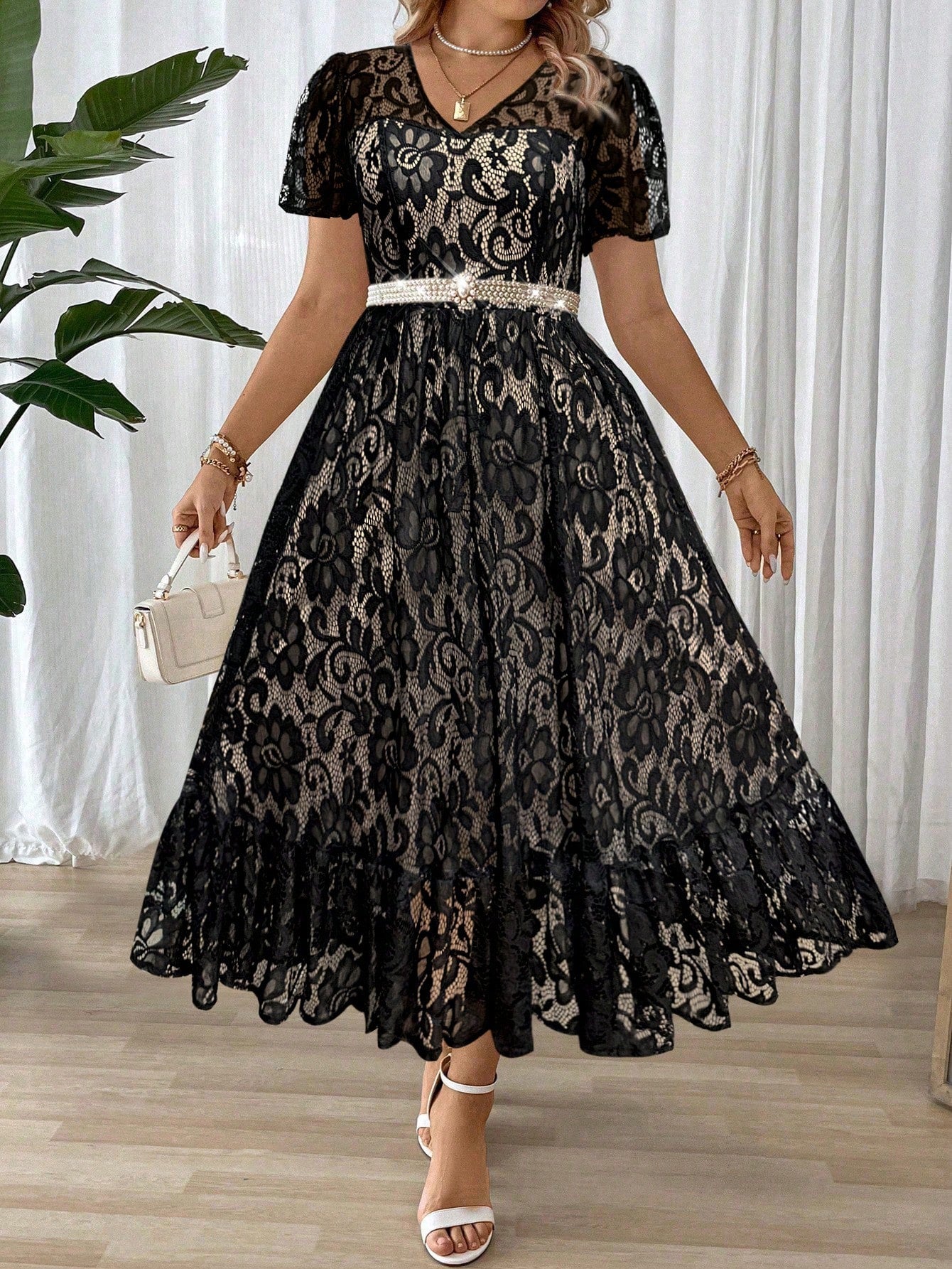 Twirl into wedding season with our stunning plus size maxi dress! This summer showstopper features a flattering V-neck that's just the right amount of flirty, while the lace ruffle hem adds a touch of whimsy to your every step. Perfect for dancing the night away or sipping champagne at summer celebrations – this elegant number ensures you'll turn heads without trying!