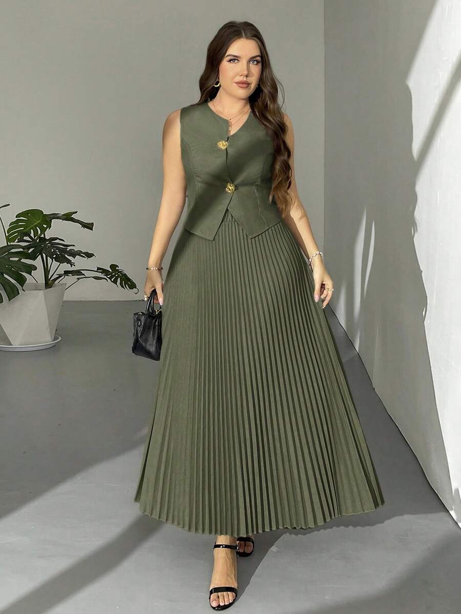 Elevate your wardrobe with this chic two-piece ensemble that proves sophistication has no size limit. The tailored French vest pairs perfectly with a pleated skirt adorned with gleaming metal buttons, creating an effortlessly polished look. Crafted in a versatile khaki tone, this set transitions seamlessly from office meetings to weekend brunch. Whether you're dressing up or keeping it casual, this playful yet refined combination lets you mix, match, and make a statement with confidence and style.