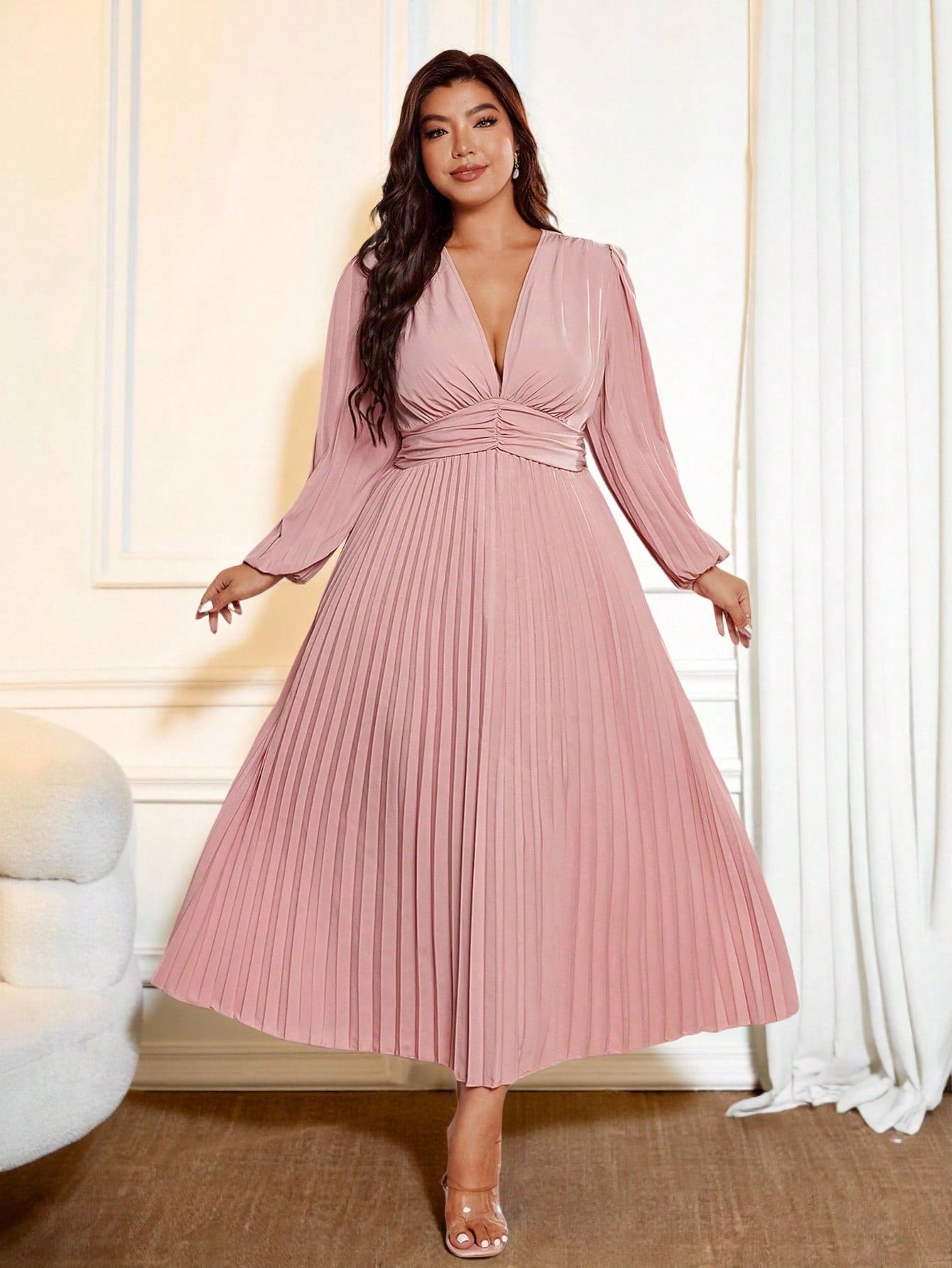 Step into spring with flair in this Elegant Plus Size V-Neck Lantern Sleeve Pleated Maxi Dress. Its flowing pleats and charming lantern sleeves create a breezy silhouette that dances with every step. Perfect for weddings or garden parties, this dress celebrates curves with a flattering V-neckline and comfortable fit—because feeling fabulous should always be effortless.