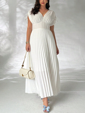 Step out in style with this Elegant Plus Size V-Neck Maxi Dress, designed to flatter your curves while keeping you cool and comfy. Its flowing silhouette and playful V-neckline make it the ultimate choice for summer parties, beach vacations, or any sunny celebration. Embrace effortless elegance and let the good vibes (and compliments) flow all season long!