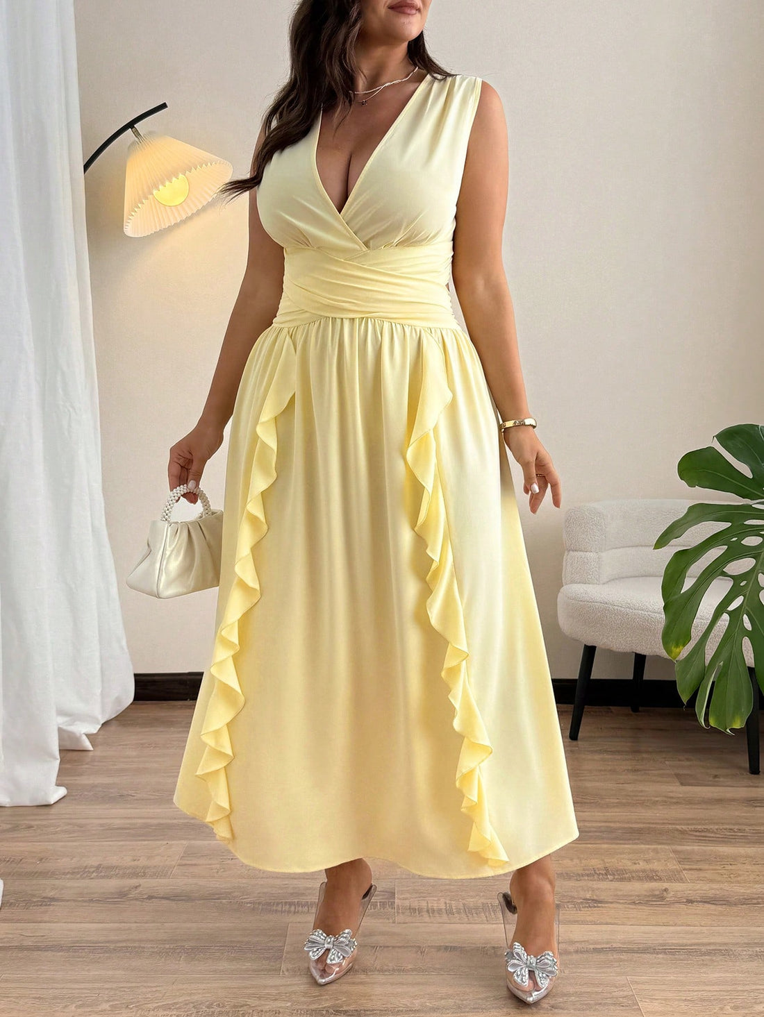 Turn heads on your getaway with this playful plus size V-neck maxi dress. The crisscross waist highlights your silhouette, while the ruffle hem adds a flirty touch with every step. Effortlessly stylish, it’s the perfect dress for vacation days filled with fun and sunshine.