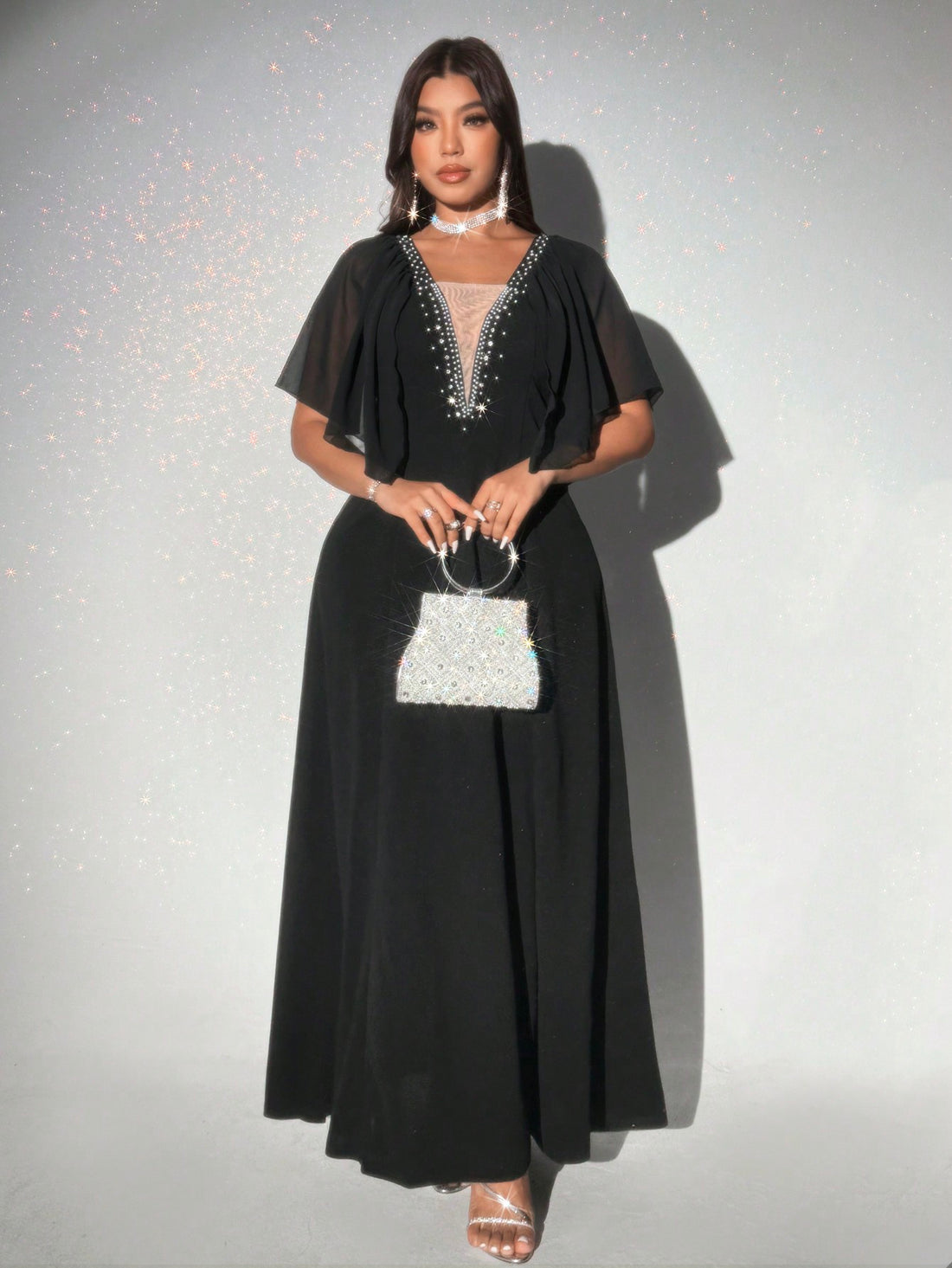 Step out in style with this Elegant Plus Size V-Neck Maxi Dress, designed to flatter every curve. The flowing maxi length pairs perfectly with sparkling diamond accents that add just the right touch of glam. Whether it’s a special occasion or a night out, this dress promises comfort and confidence with a playful twist. Feel fabulous and shine bright wherever you go!
