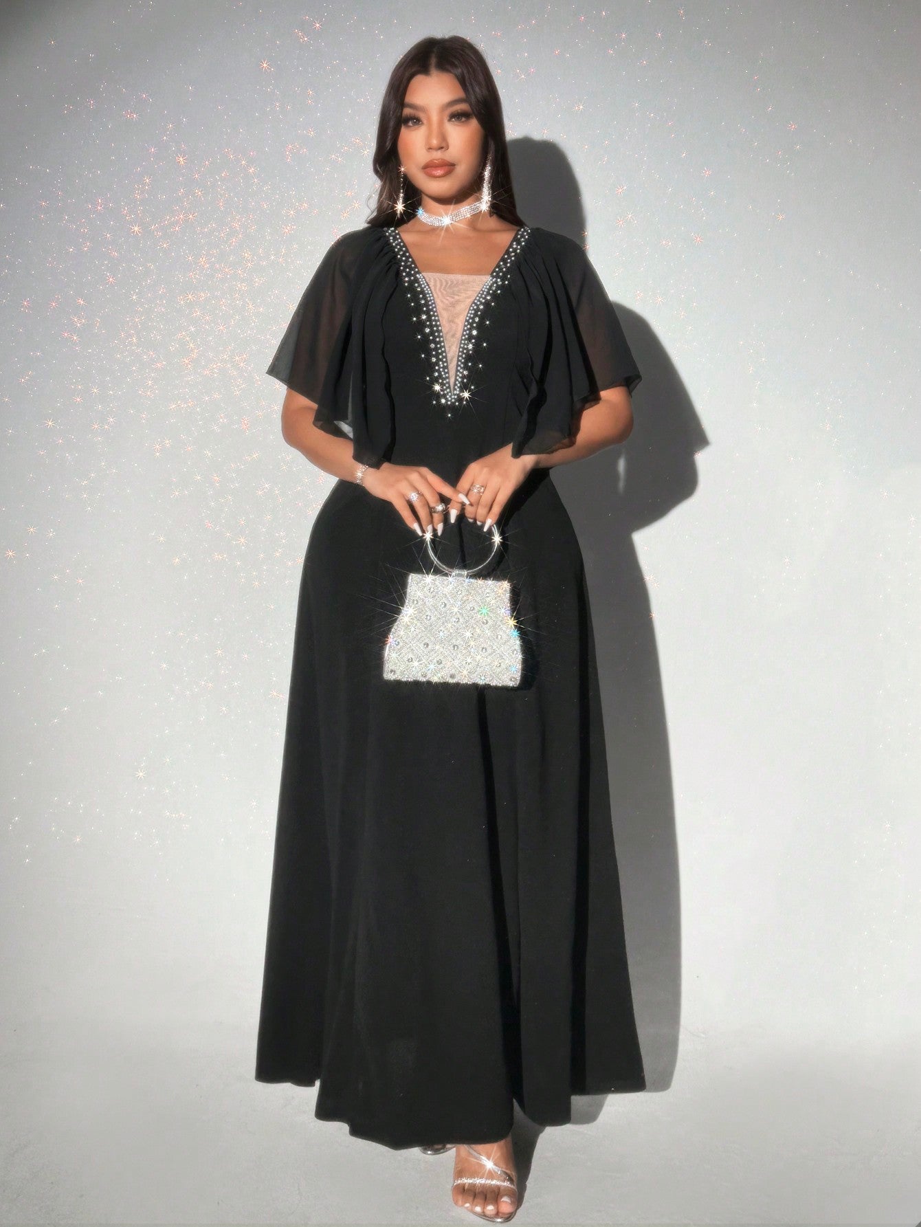 Step out in style with this Elegant Plus Size V-Neck Maxi Dress, designed to flatter every curve. The flowing maxi length pairs perfectly with sparkling diamond accents that add just the right touch of glam. Whether it’s a special occasion or a night out, this dress promises comfort and confidence with a playful twist. Feel fabulous and shine bright wherever you go!