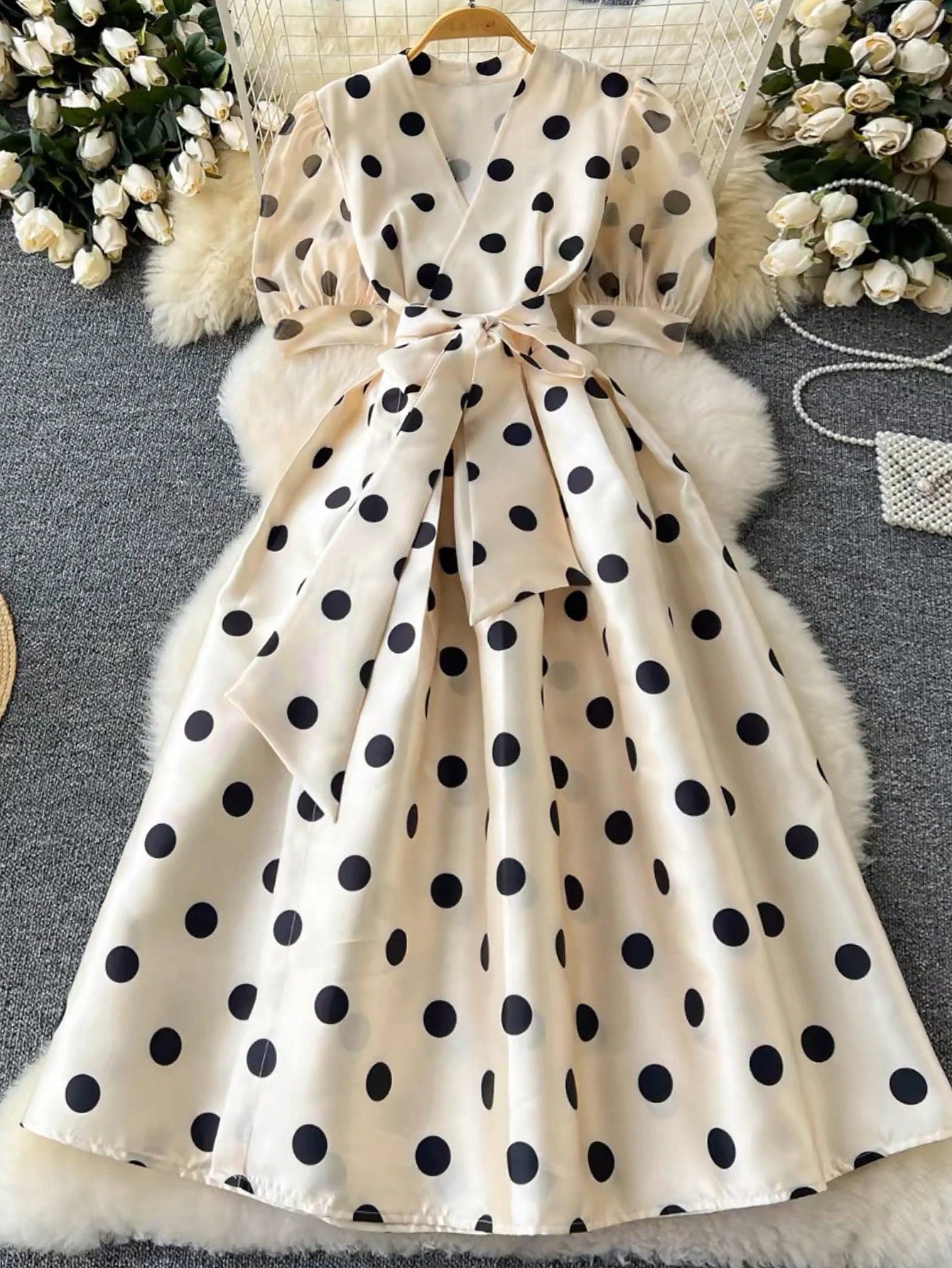 Step out in style with this Elegant Plus Size V-Neck Midi Dress, featuring a charming polka dot pattern that adds a playful touch to your look. Designed for comfort and confidence, its flattering V-neck and flowing midi length make it perfect for any casual occasion. Embrace effortless elegance and let your personality shine in this fun, flattering dress made just for you.