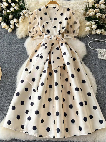 Step out in style with this Elegant Plus Size V-Neck Midi Dress, featuring a charming polka dot pattern that adds a playful touch to your look. Designed for comfort and confidence, its flattering V-neck and flowing midi length make it perfect for any casual occasion. Embrace effortless elegance and let your personality shine in this fun, flattering dress made just for you.