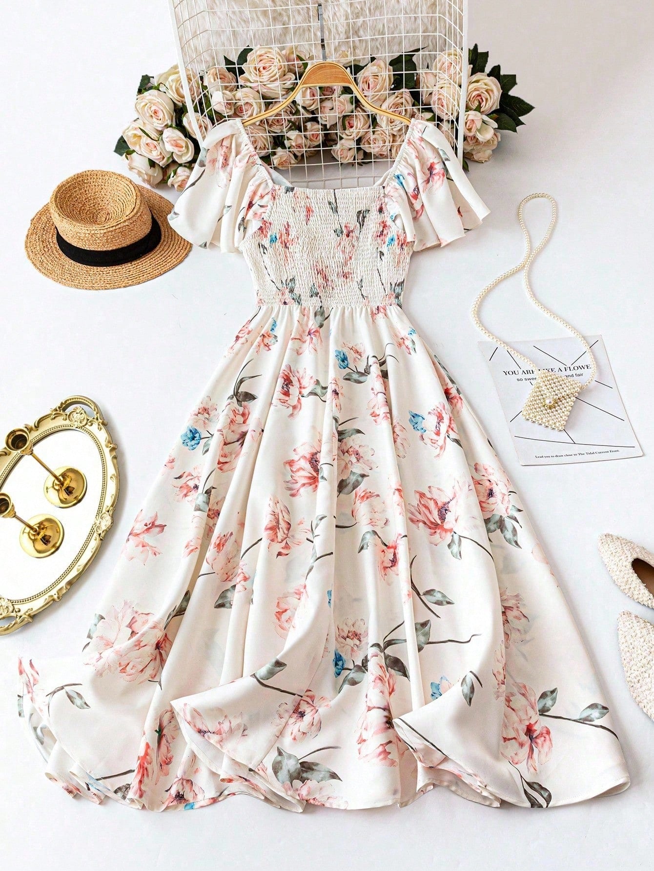 Step out in style with this Elegant Plus Size V-Neck Ruffle Sleeve Ditsy Floral Maxi Dress! Its playful ruffle sleeves and charming ditsy floral pattern add a flirty touch, while the flattering V-neckline enhances your silhouette. Perfect for any occasion, this maxi dress combines comfort and elegance effortlessly—whether you're brunching with friends or dancing the night away. Embrace your curves and let your confidence bloom!