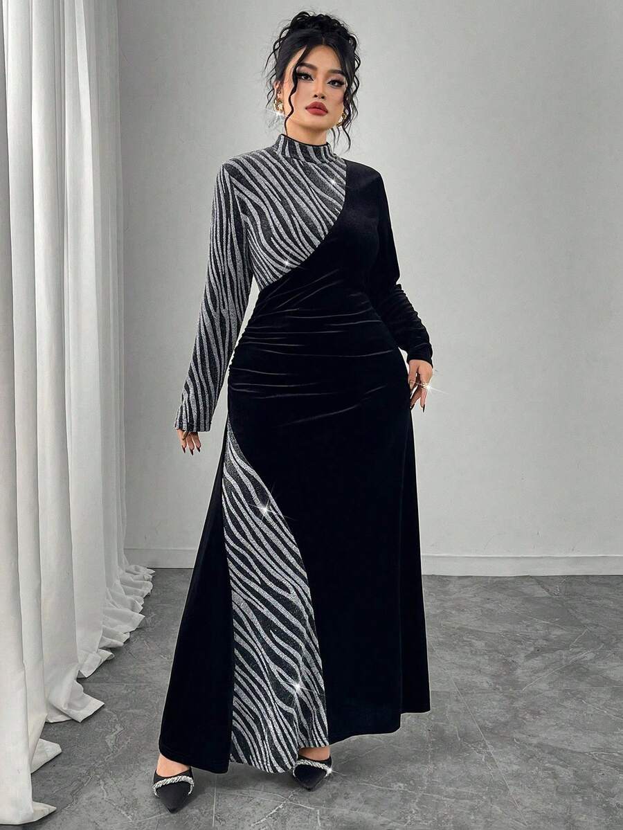 Make a statement this season in our Elegant Plus Size Velvet Patchwork Party Dress! Featuring a chic stand collar and luxurious velvet patchwork design, this showstopper blends sophistication with fun. Perfect for autumn and winter celebrations, the flattering silhouette and rich textures create an effortlessly glamorous look. Whether you're heading to a holiday party or special gathering, this dress lets you celebrate in style and comfort. Embrace your curves and turn heads in this versatile piece that tra