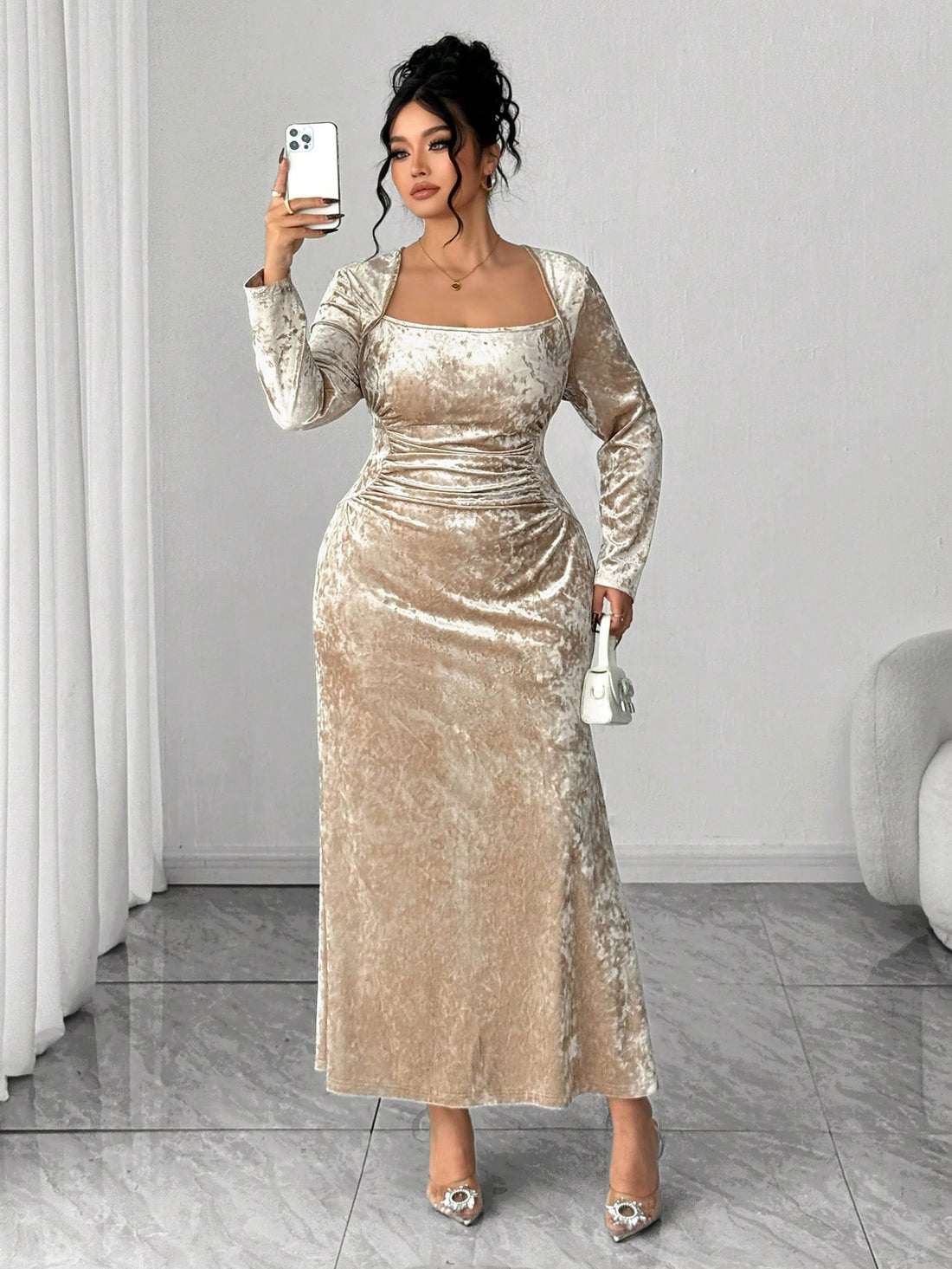 Slip into sophistication with this show-stopping velvet turtleneck dress that hugs you in all the right ways. The ruched waist creates a flattering silhouette while the dramatic fishtail hem adds a flirty twist to your evening look. Crafted in sumptuous velvet, this plus-size beauty is your go-to for autumn and winter cocktail parties where you want to turn heads. Cozy, chic, and unapologetically glamorous—because confidence looks best in velvet.