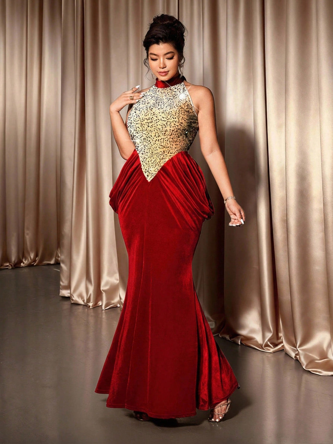 Step into timeless elegance with this stunning burgundy maxi dress that's as versatile as it is gorgeous. The delicate beading catches light beautifully, while the classic halter neckline flatters every frame. Perfect for weddings, date nights, or whenever you want to feel absolutely fabulous, this vintage-inspired piece celebrates your curves with confidence. The flowing maxi silhouette offers comfort without compromising on style—because looking amazing should feel amazing too!