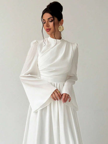 Elevate your wardrobe with this stunning plus-size white dress that's as versatile as you are! Whether you're crushing it at the office, turning heads at a party, or making a memorable impression on a date, this elegant piece has you covered. The crisp white hue flatters every complexion while the thoughtfully designed silhouette celebrates your curves with confidence and grace. Dress it up with heels and statement jewelry or keep it casual with sneakers and a denim jacket—this wardrobe essential adapts to 