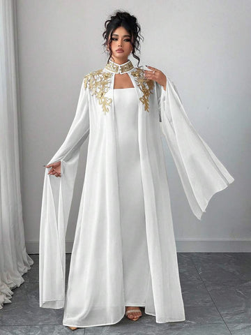 Elevate your wardrobe with this stunning plus-size 2-piece set, perfect for fall occasions. The ensemble features an elegant white dress with sleeveless design and delicate flower appliqué details, paired with a flowing chiffon jacket boasting extra-long sleeves and a stand collar with ruffled trim. Crafted from quality knitted fabric with medium stretch for comfort, the dress offers a slim fit silhouette while the lightweight jacket provides layered sophistication. Ideal for formal events, celebrations, an