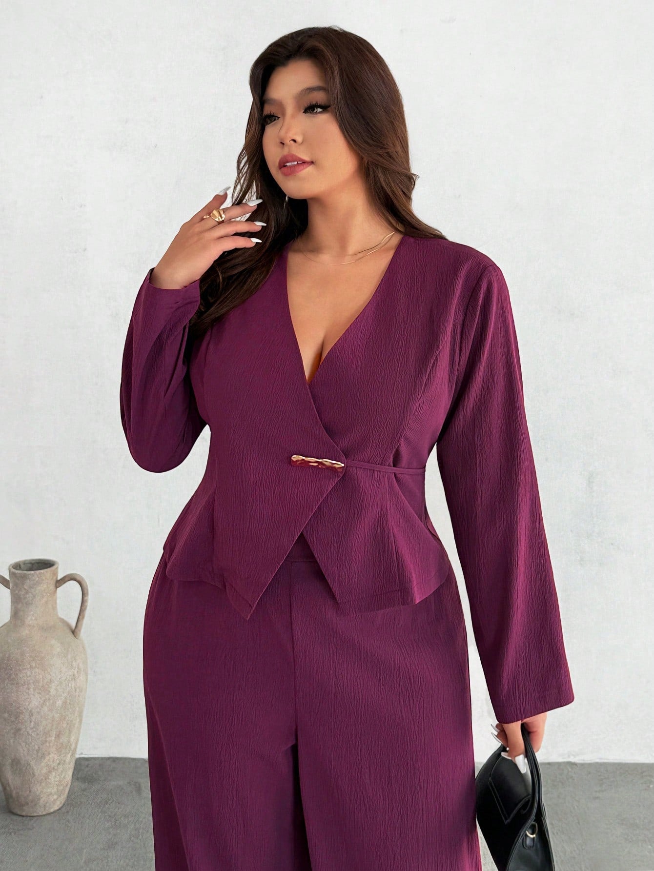 Elevate your work wardrobe with this chic two-piece suit designed for the modern professional! The flattering V-neck cut and thoughtful button details create a polished look that transitions seamlessly from the office to your commute. Crafted in plus sizes, this casual yet sophisticated ensemble celebrates your style while keeping comfort front and center. Whether you're heading to meetings or grabbing coffee, you'll feel confident and put-together in this versatile staple that proves business casual never 