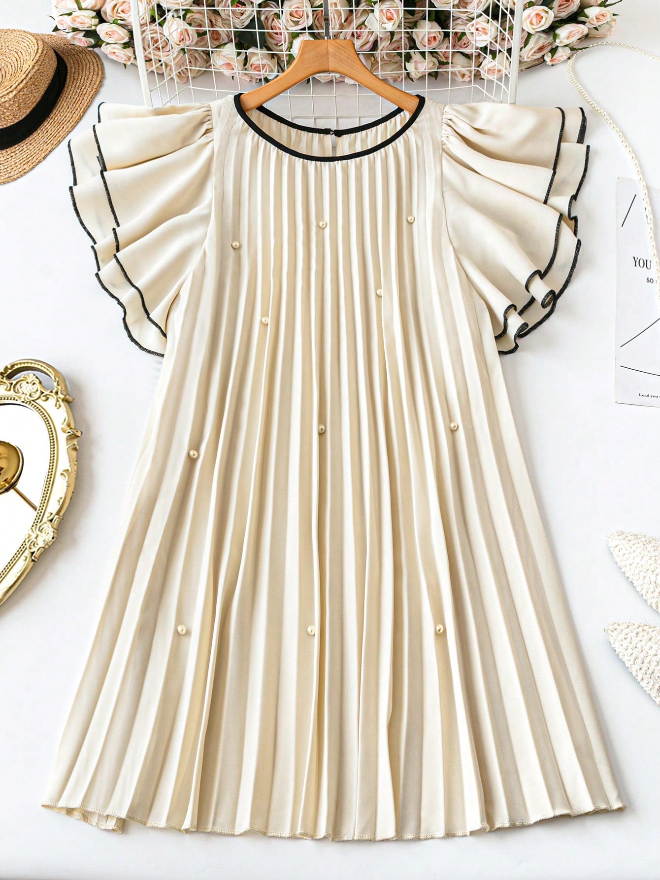 Step out in style with this Elegant Plus Size Women's Pearl Decor Knit Dress, perfect for romantic dates or adding charm to your everyday look. Soft knit fabric hugs your curves comfortably, while delicate pearl accents bring a touch of whimsy and sophistication. Whether you're out for a cozy coffee or a special evening, this dress makes every moment feel a little more magical.