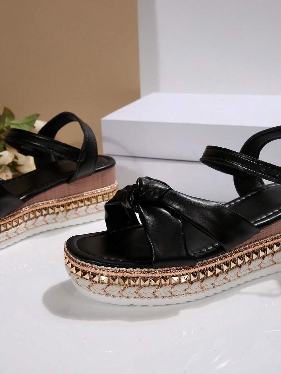 Step into summer with these playful plus size wedge sandals, featuring a chic one-strap design adorned with trendy rivet details. The adjustable buckle ensures a perfect fit, while the platform wedge adds height and comfort for all-day fun. Perfect for stylish holidays, these sandals blend fashion and ease to keep you dancing through sunny days with confidence.