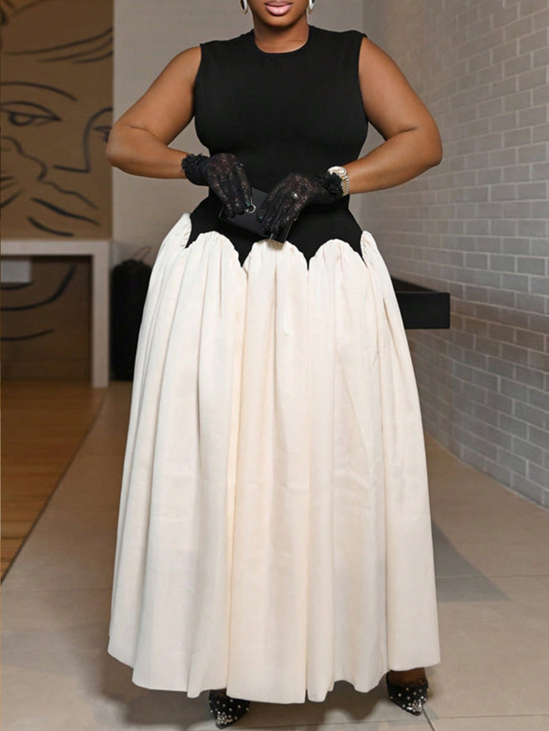 Elevate your evening wardrobe with this sophisticated plus-size ball dress, designed for refined elegance. The sleeveless silhouette offers a graceful, timeless appeal, while the distinctive wave splicing detail adds visual interest and dimension. Strategic contrast color blocking creates a flattering, dynamic look that enhances your natural curves. Crafted for comfort and confidence, this dress transitions seamlessly from formal events to special occasions. The structured ball gown cut provides a polished,