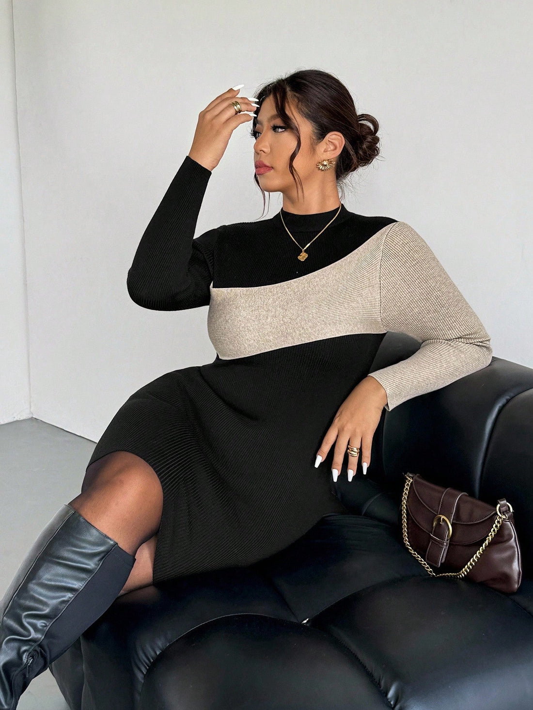 Embrace cozy charm with this elegant plus size two-tone knit dress, perfect for fall and winter days. Its long sleeves and bodycon fit highlight your curves while keeping you comfy and stylish. Inspired by French romantic flair, this dress adds a whimsical touch to your seasonal wardrobe, making every outing feel a little more special and a lot more fun.